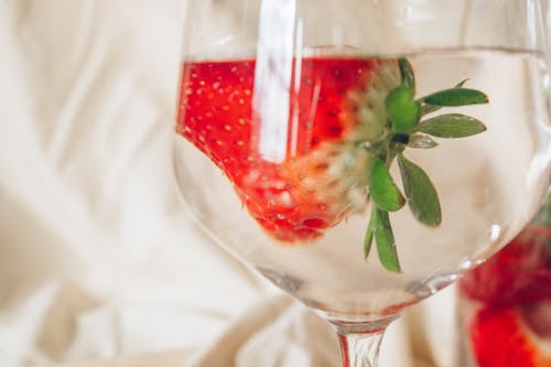 Strawberry Juice in Clear Wine Glass