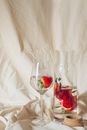 Strawberries in a Wineglass and Jar with Water