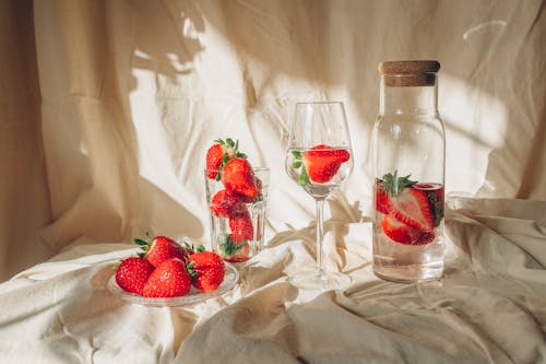 Red Strawberries in Clear Glass Jar