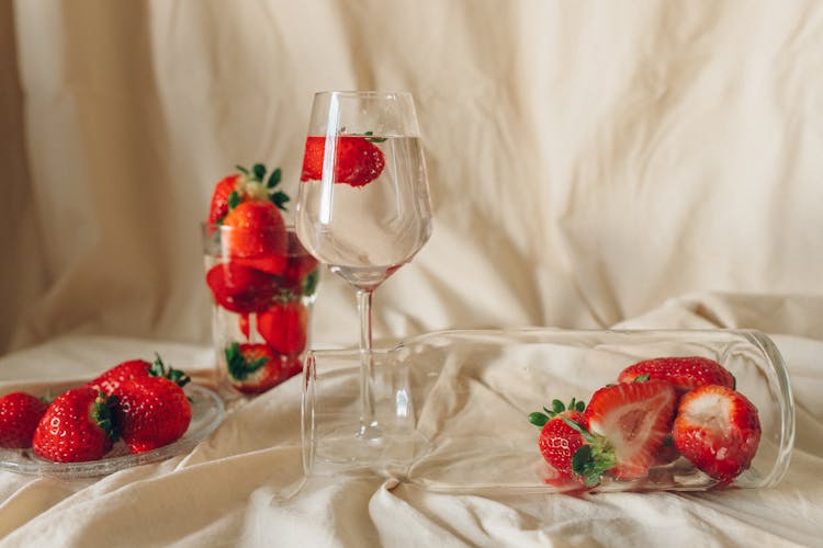 Red Strawberries In Clear Wine Glass