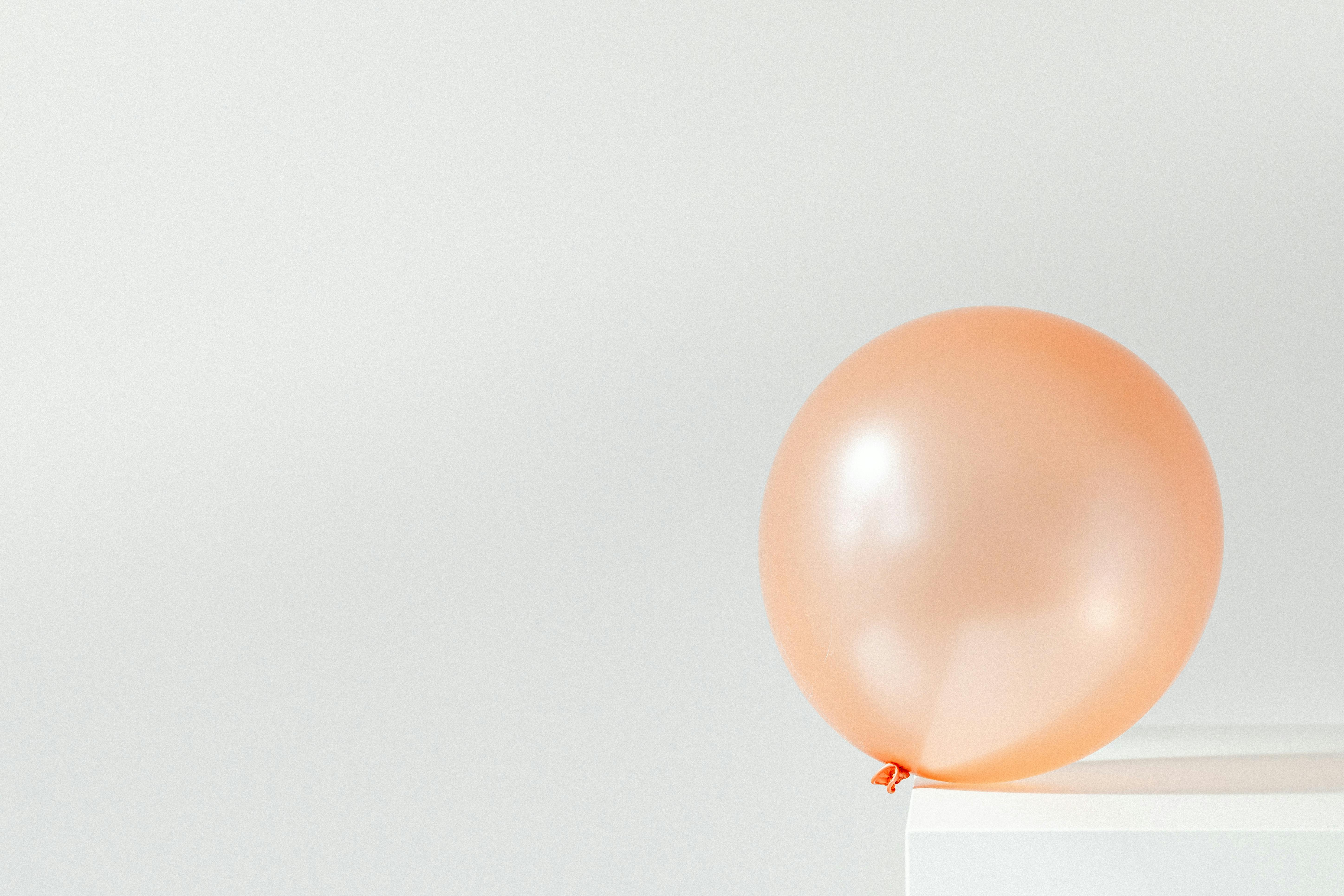 orange balloon on white background