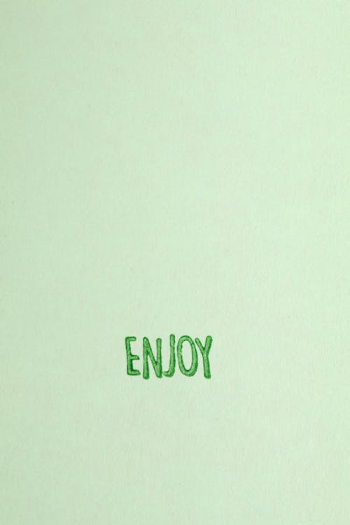 Enjoy Text on  Green Background