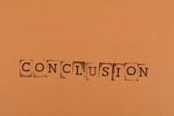 Conclusion Text on Orange Background