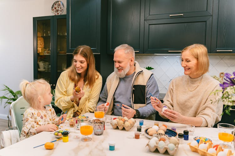 Family Decorating Eggs For Easter 