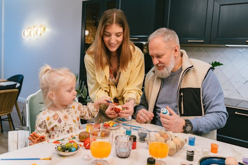 A Family Painting Easter Eggs Together