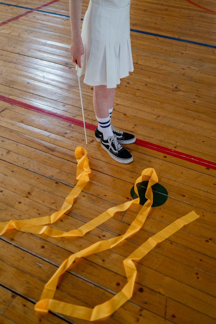 A Girl Holding Yellow Ribbon