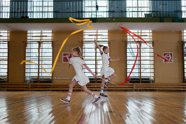 Twins Doing Rhythmic Gymnastics