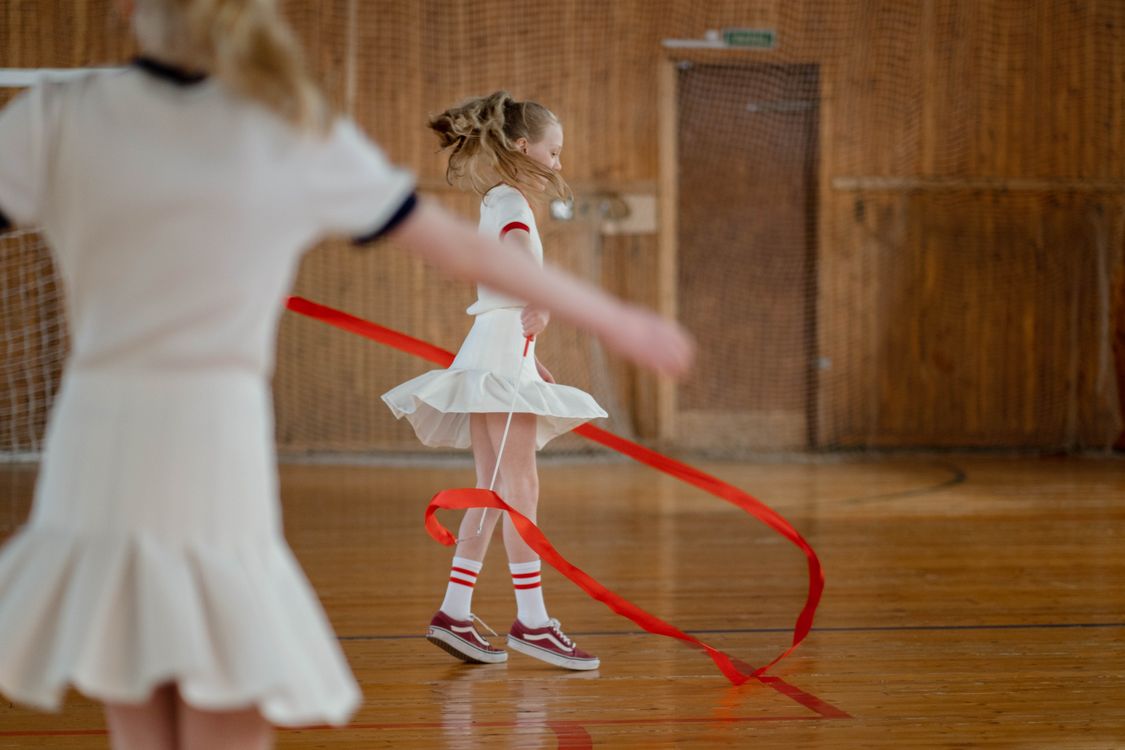 Girl Using Gymnastic Ribbon · Free Stock Photo