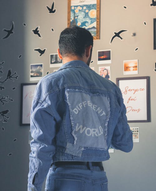 Free Back View of a Man in Denim Jacket Stock Photo
