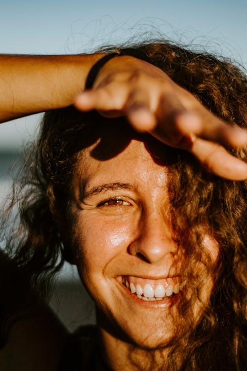 Smiling Woman With Black Hair