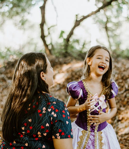 Happy Girl in Purple Dress