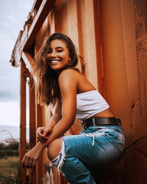 Woman in Casual Wear Smiling at Camera