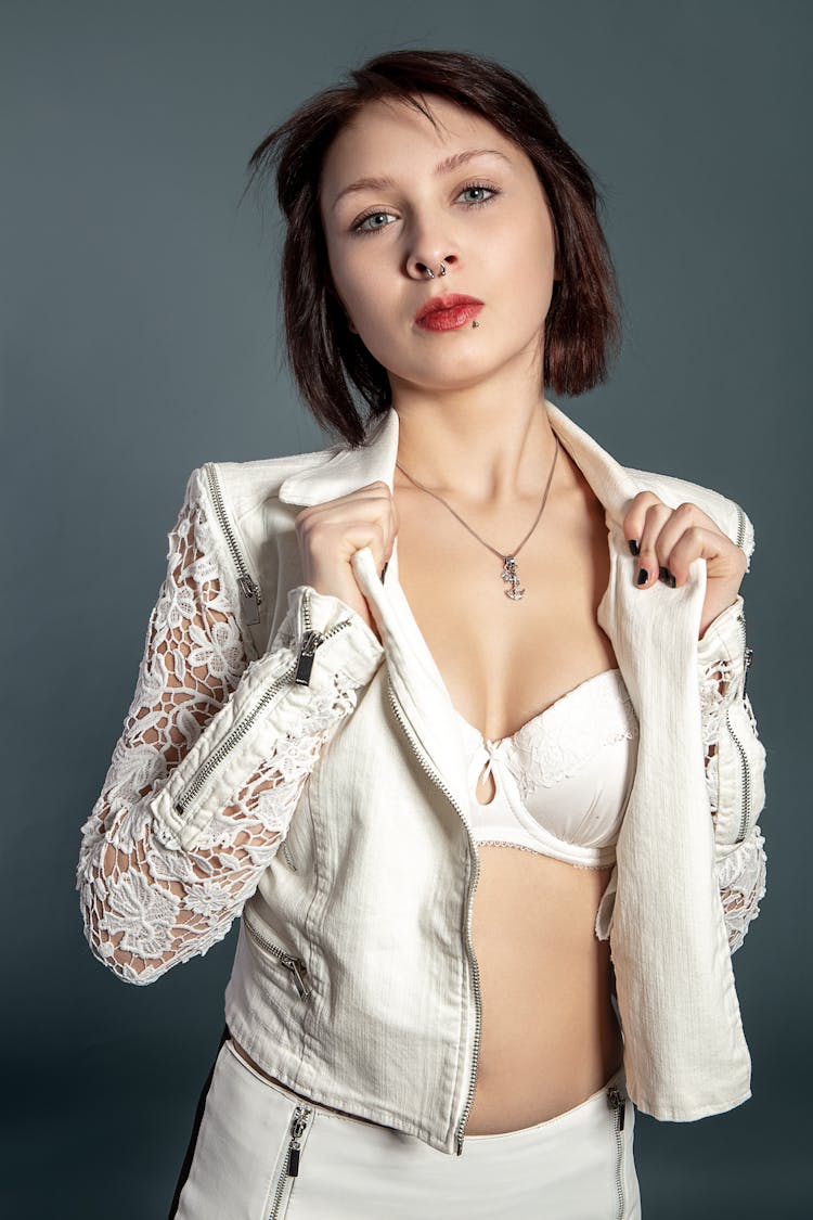 Woman In White Brassiere And White Lace Cardigan