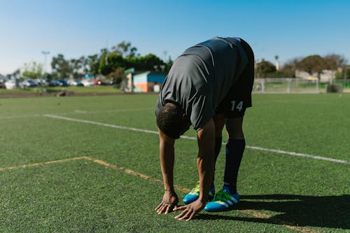 Man Reaching Toes Stretching