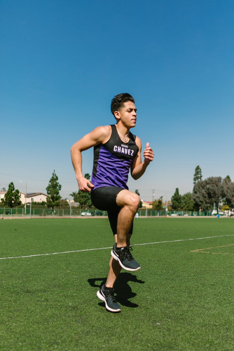 Man Jogging On The Open Field