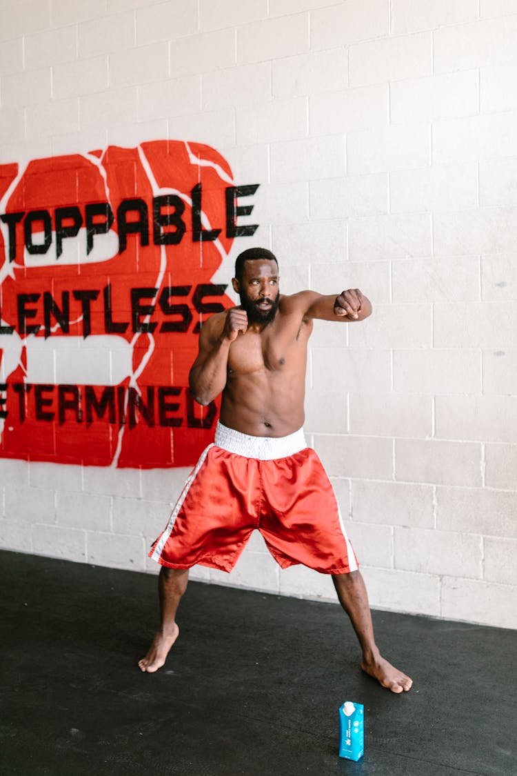 A Bearded Man Shadow Boxing