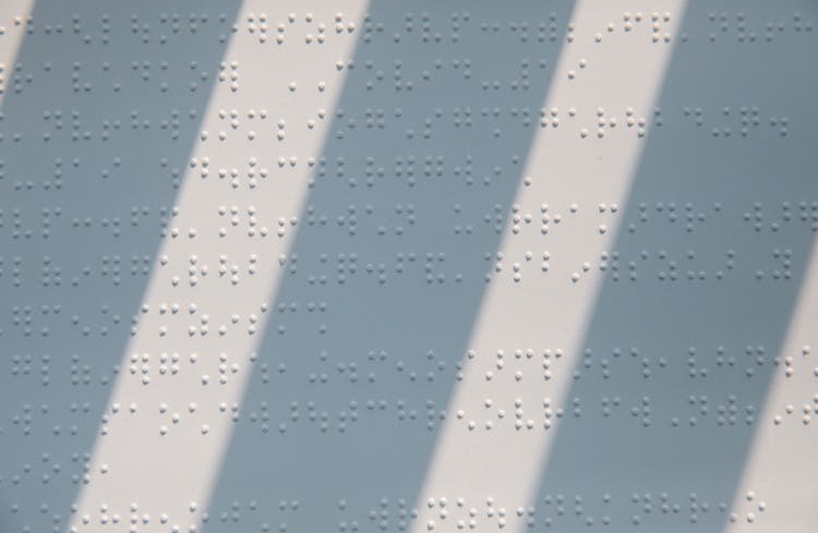 Close-Up Photo Of Braille Characters