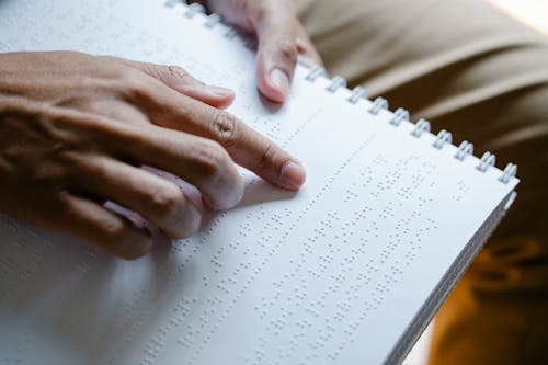 Photo of Person Using Braille