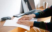Photo of Person Using Braille