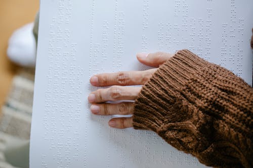 Photo of Person Learning Braille