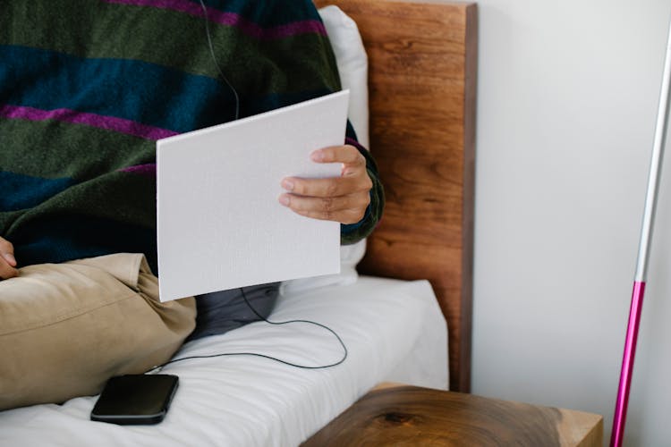 Photo Of Person Holding Blank Paper