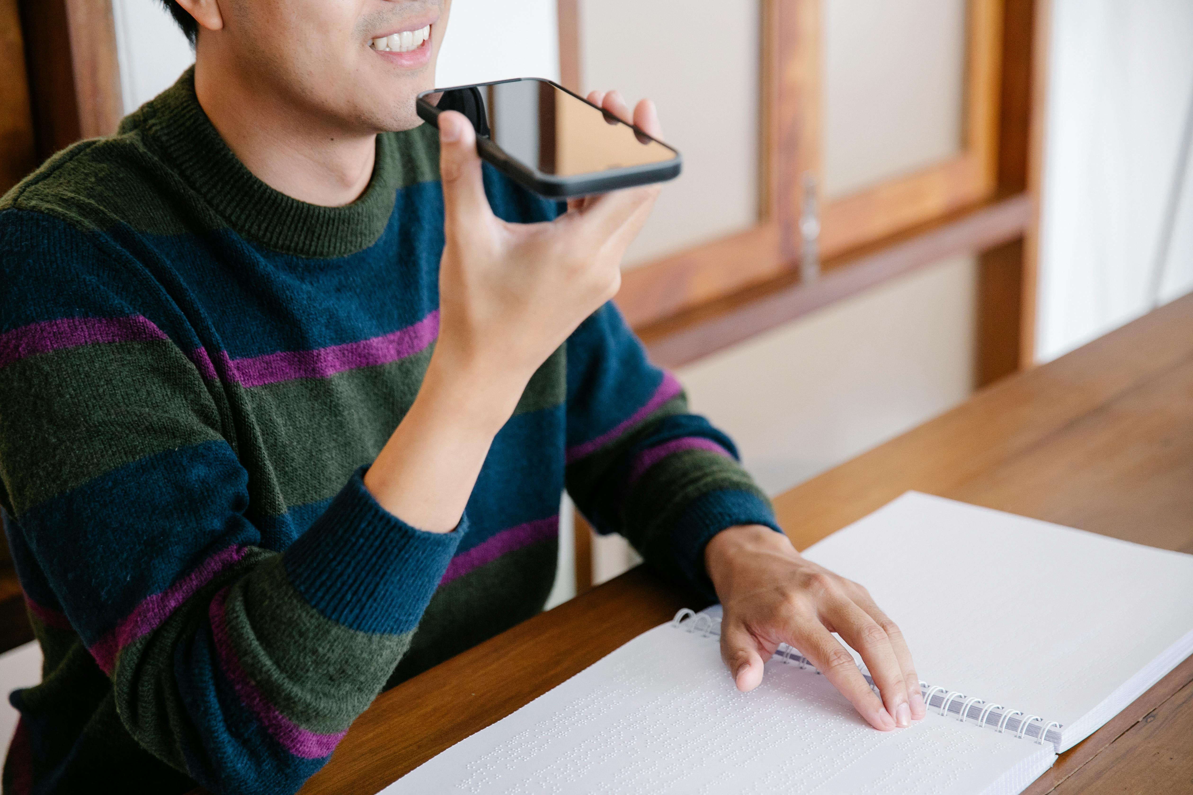 photo of man talking on phone