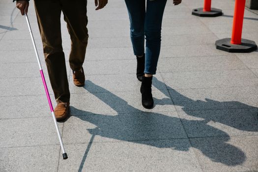 Photo of People Walking on Pavement