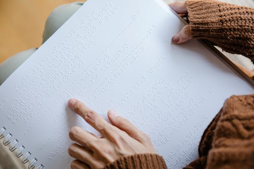 Free Photo of Person Using Braille Stock Photo