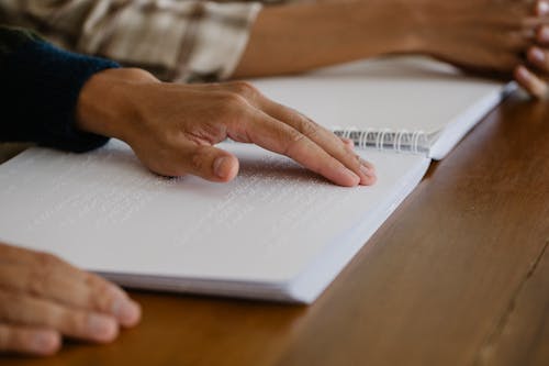 Photo of Person Learning Braille