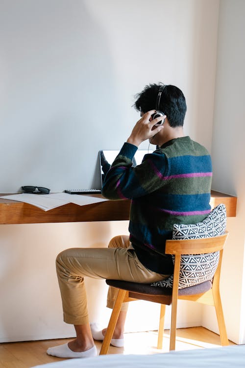 Photo of Man Listening to Music