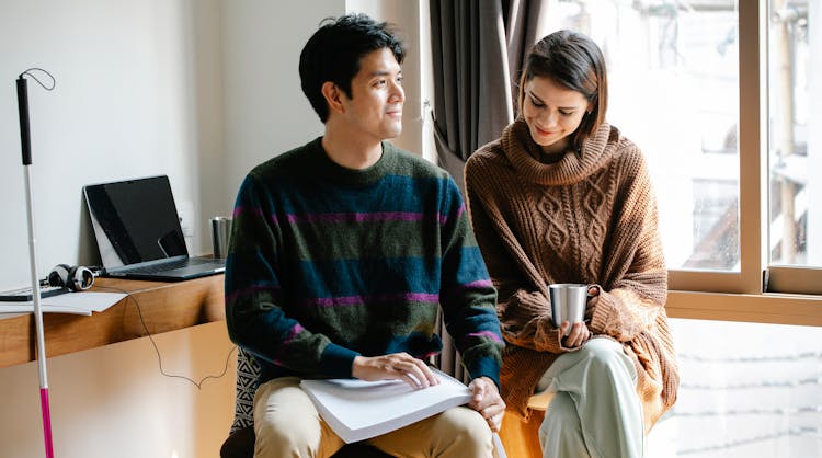 Photo Of Man Happily Learning Using Braille