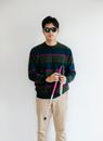 Photo of Man Holding Dismantled Cane