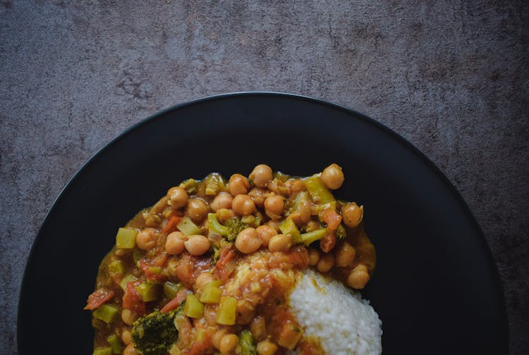 Tasty Rice With Stewed Vegetables On Plate