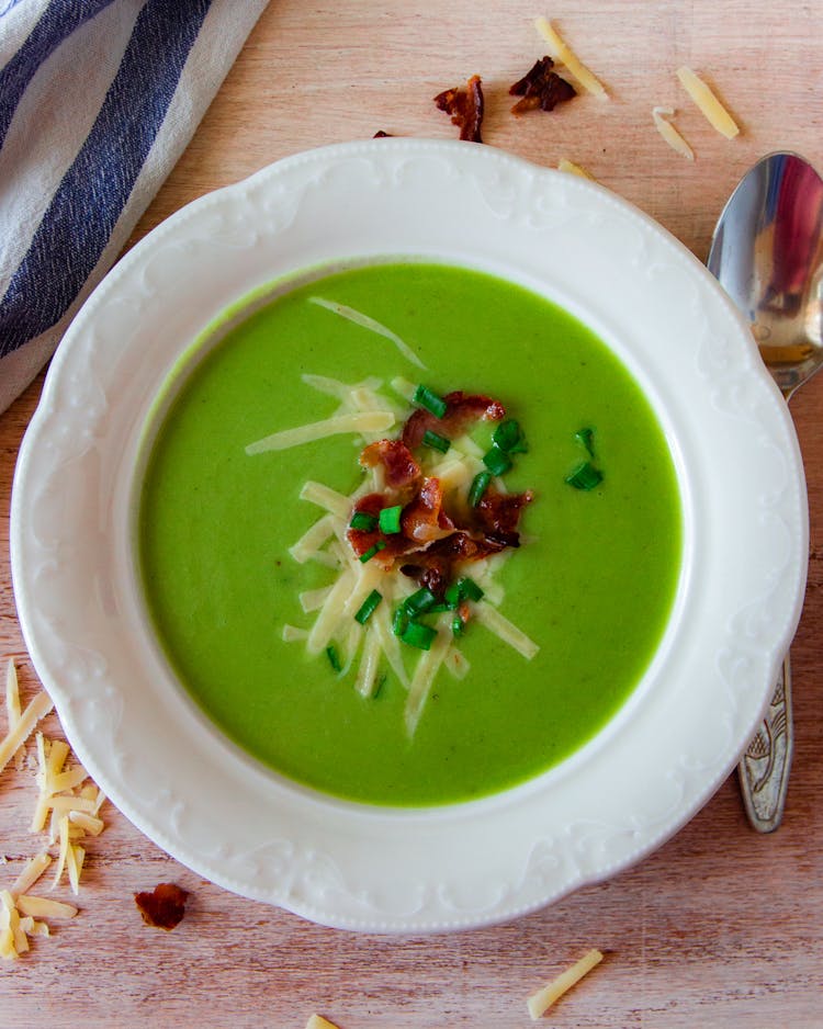 Green Soup Dish On White Ceramic Bowl