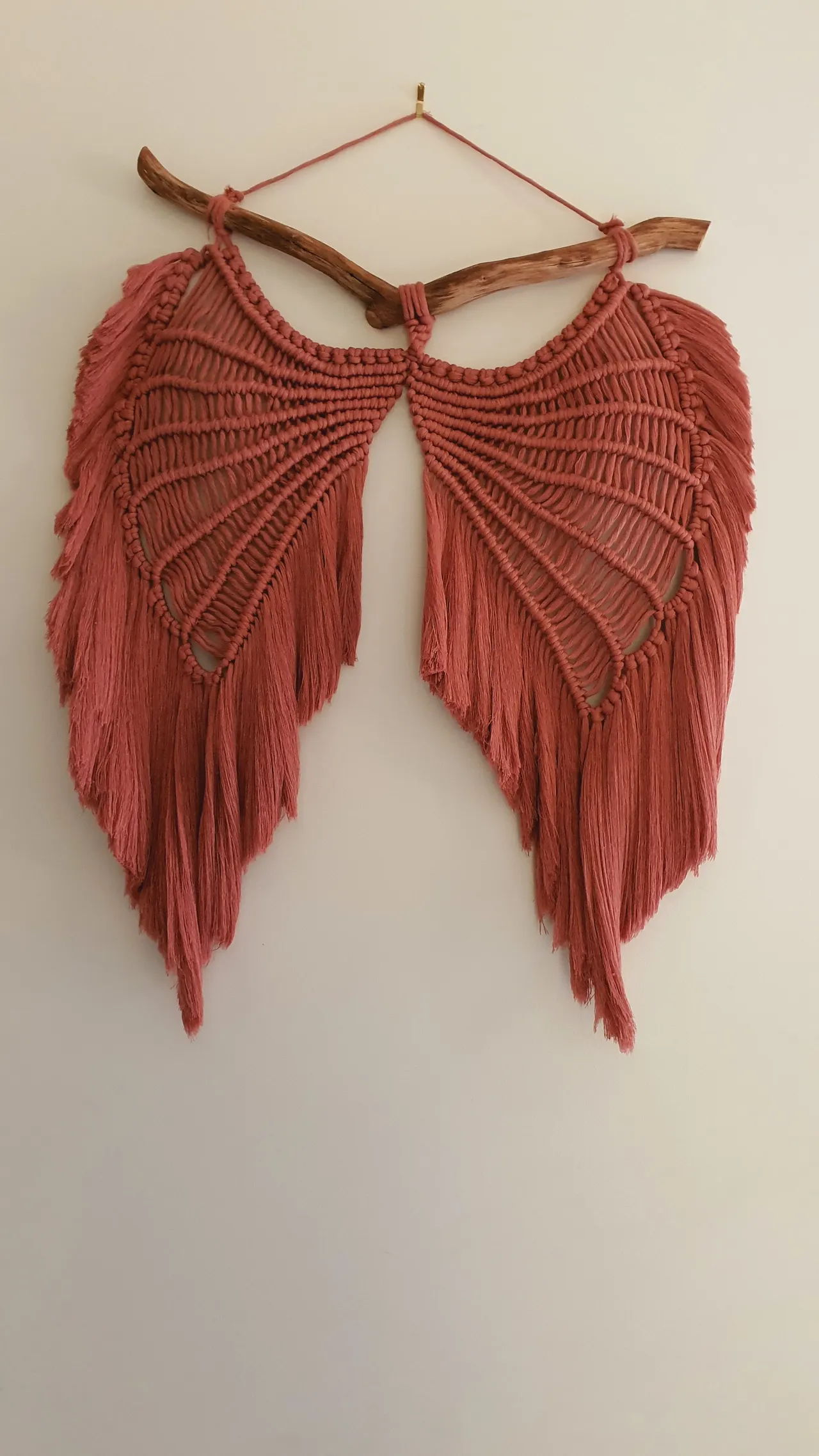 macrame-wall-hanging-decor Handmade macrame wall hanging with detailed knotted patterns