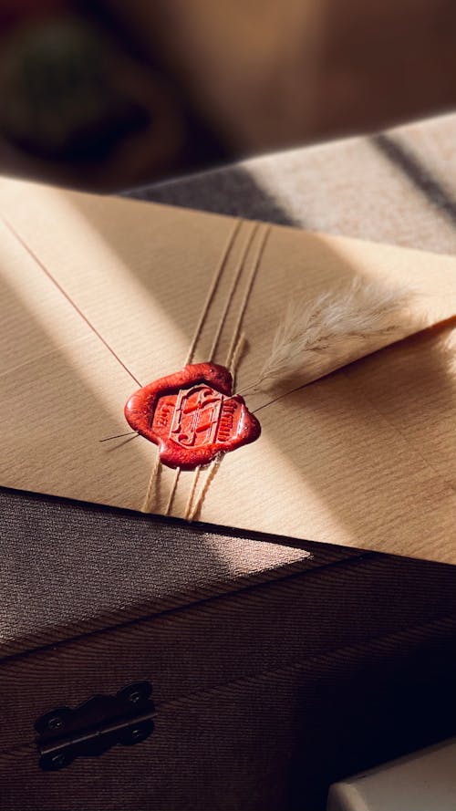 Free Brown Envelope with Red Wax Seal  Stock Photo