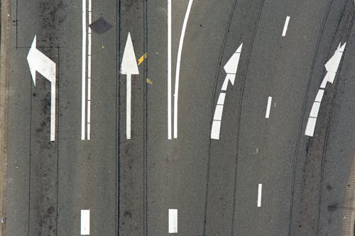 Arrows on an Asphalt Road