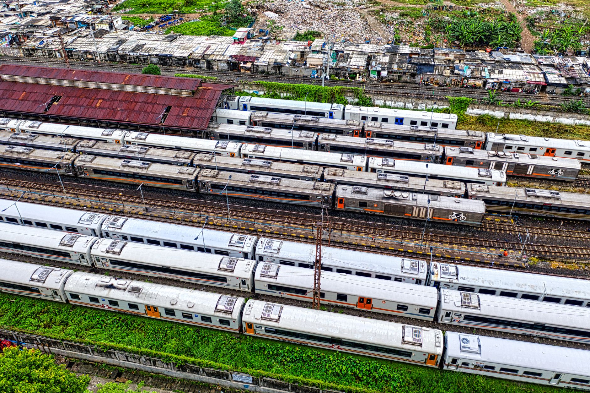 Rescuers cut through wreckage after deadly Jakarta train crash