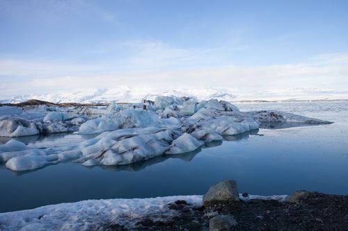 Free Majestic icebergs float in the tranquil waters of Jökulsárlón Glacier Lagoon, Iceland. Stock Photo
