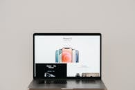 An Illuminated Computer Laptop Screen with White Background