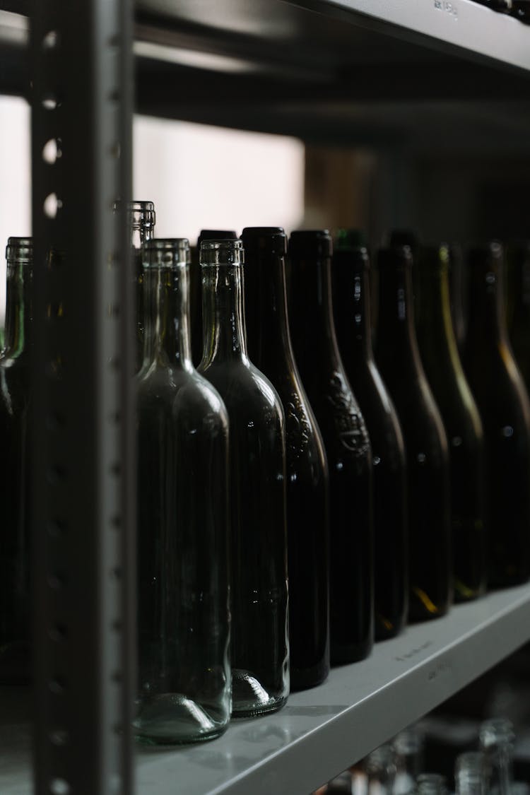 Black Glass Bottles In The Row