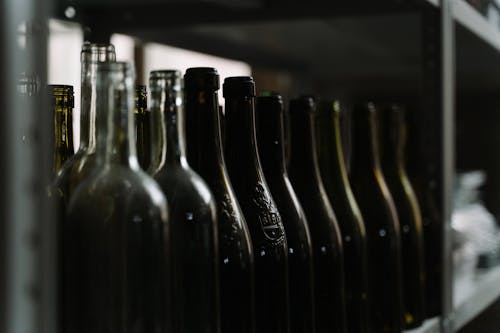 Black Glass Bottles on Table