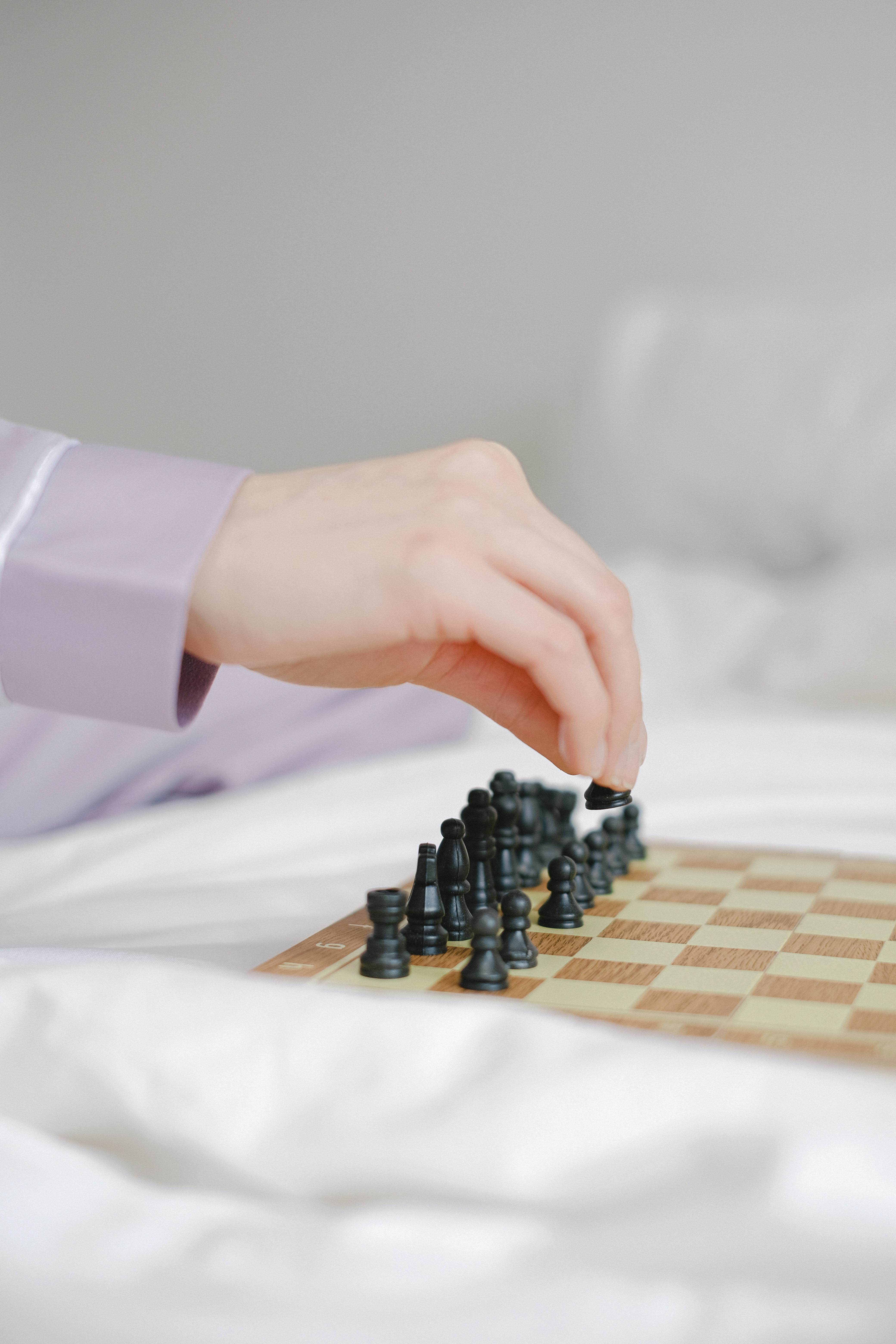 Man Holding Chess Piece · Free Stock Photo