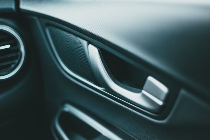 Interior door panel and handle detail — photo by Erik Mclean on Pexels