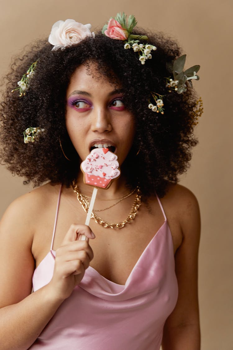 Photo Of Woman Eating Lollipop