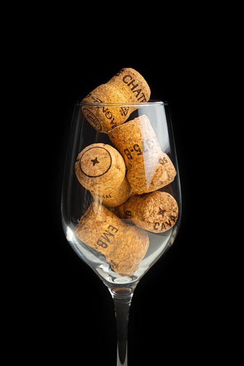 Free Champagne Corks in a Glass Stock Photo