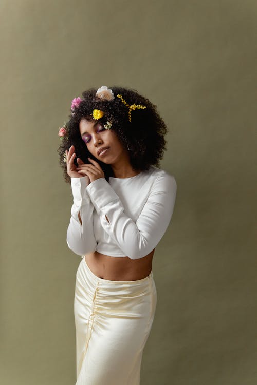 Free Woman Wearing a White Long Sleeve Crop Top Posing Stock Photo