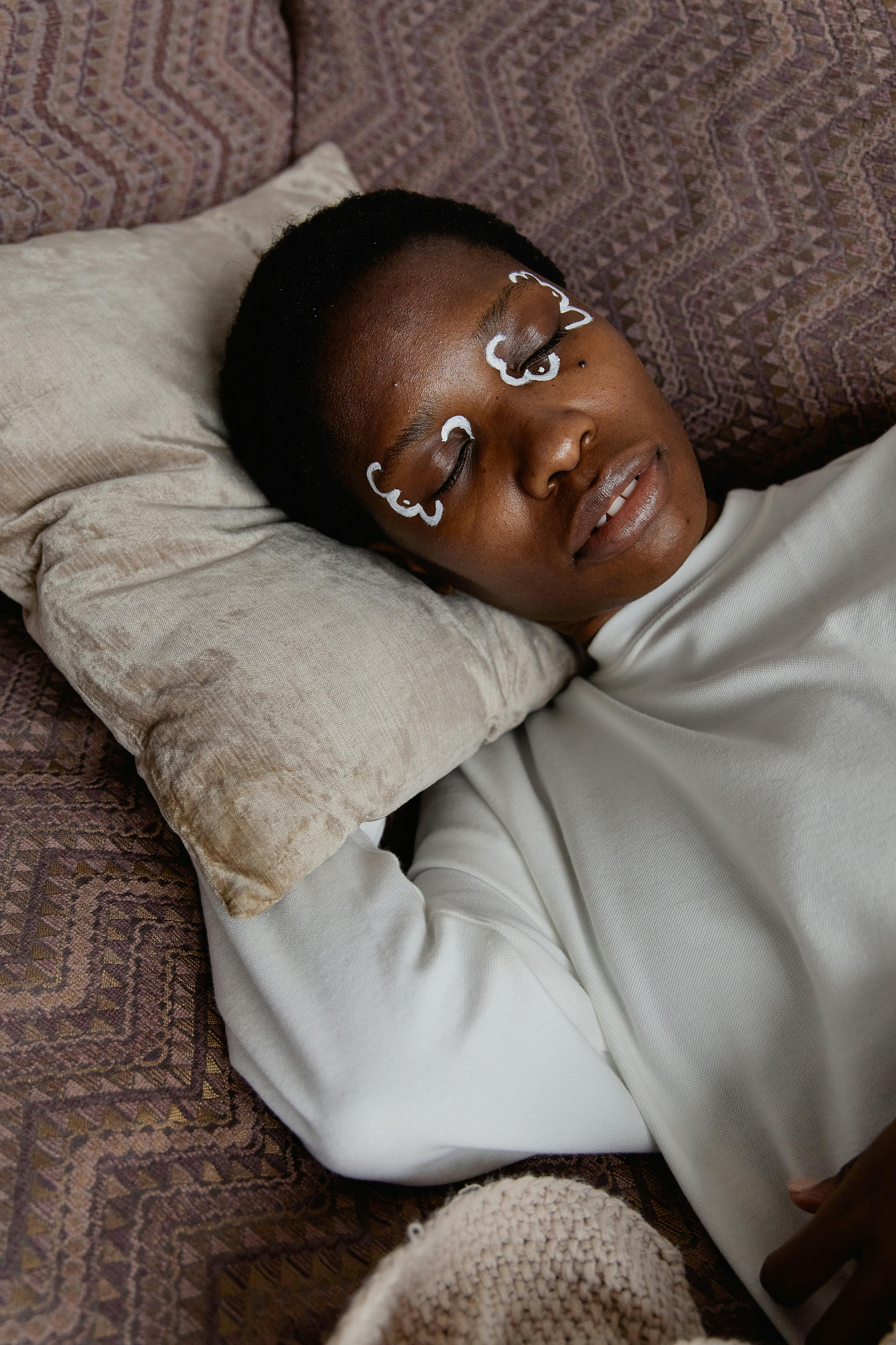Woman Sleeping on Throw Pillow · Free Stock Photo
