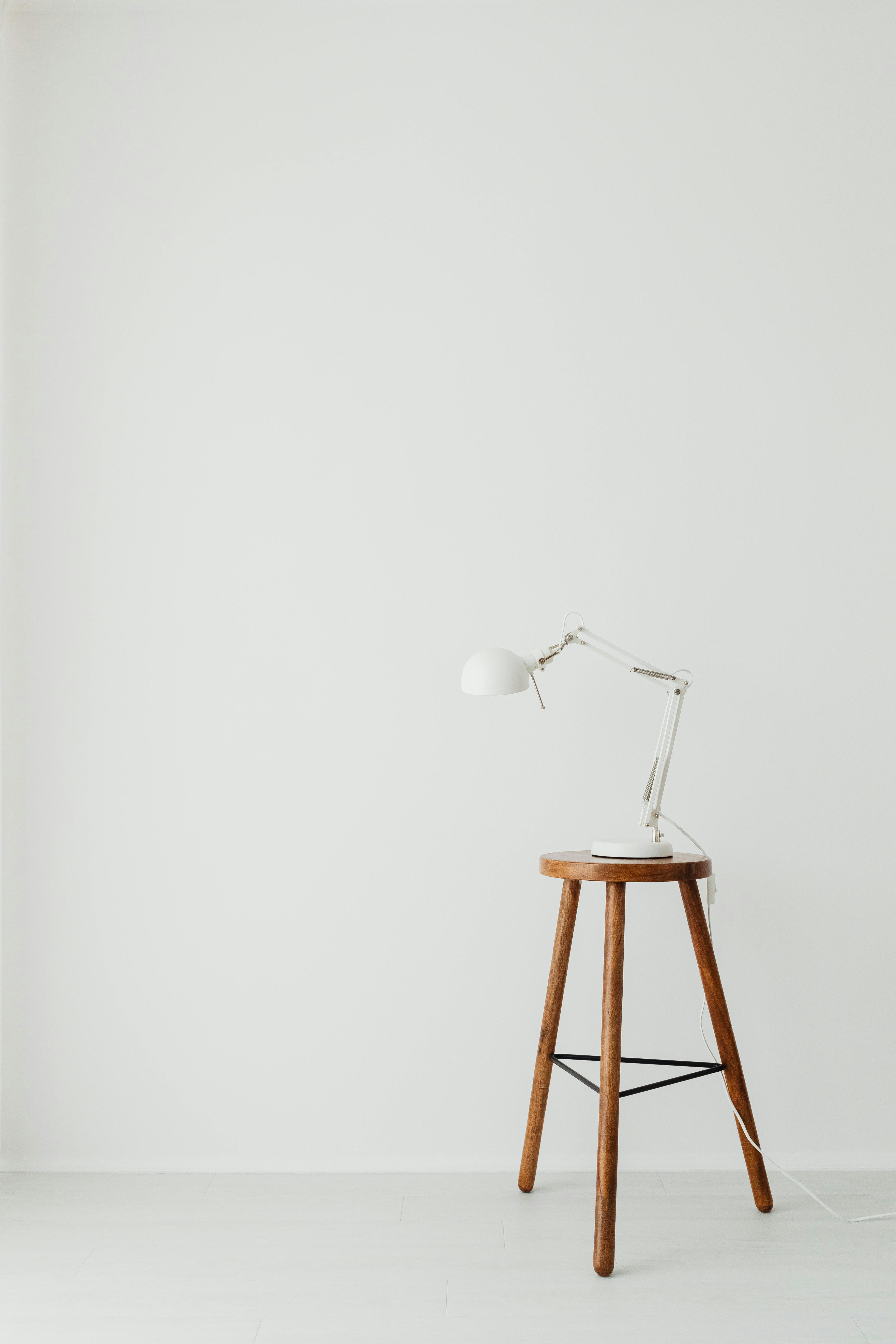 White 5-light Floor Lamp Near White Painted Wall · Free Stock Photo