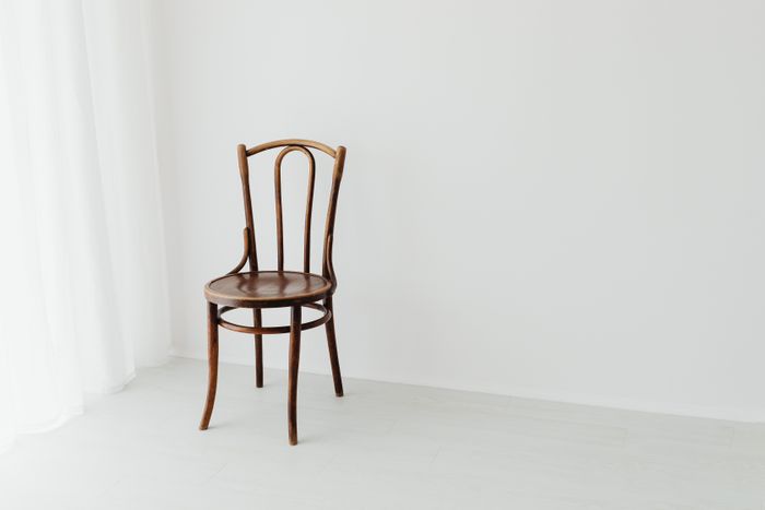 Bentwood chair in a bright minimalist room, photo by kaboompics.com on Pexels